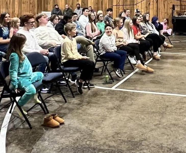 A row of seated guests laughing during one of Chris Meece’s shows