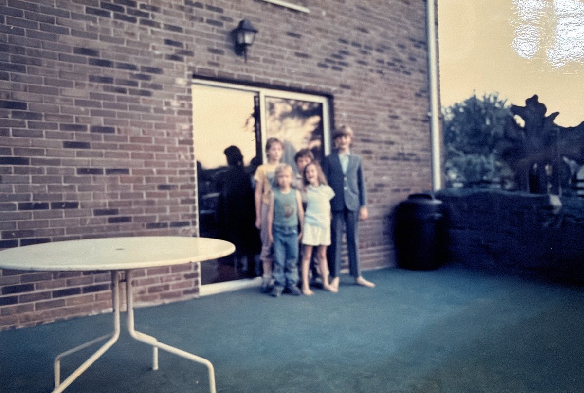 A young Chris Meece in a suit before one of his first shows
